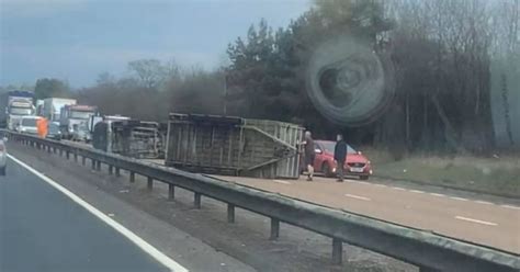 Edinburgh commuters facing delays after car overturns on busy .
